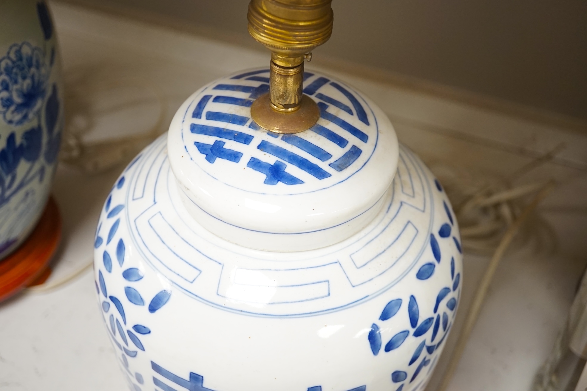 Two Chinese porcelain jars mounted as lamps and a similar blue and white octagonal jardiniere, largest 35cm wide. Condition - good (3)